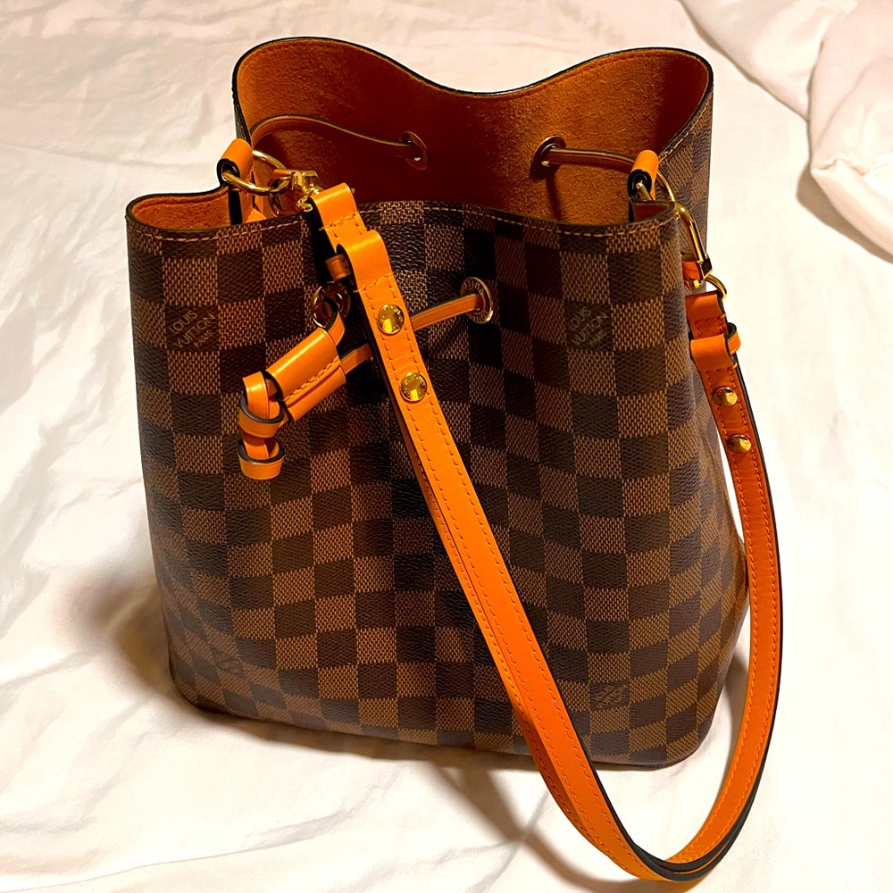 Louis Vuitton draw string crossbody and shoulder bag